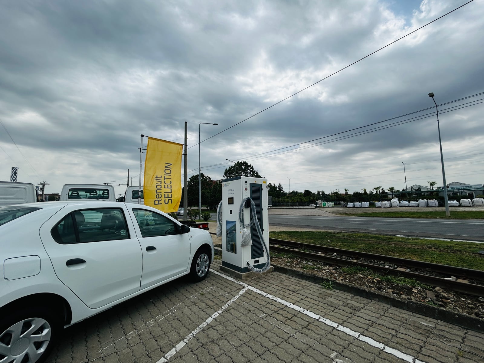Customer-branded HG Power DC charging equipment photographed in Romania