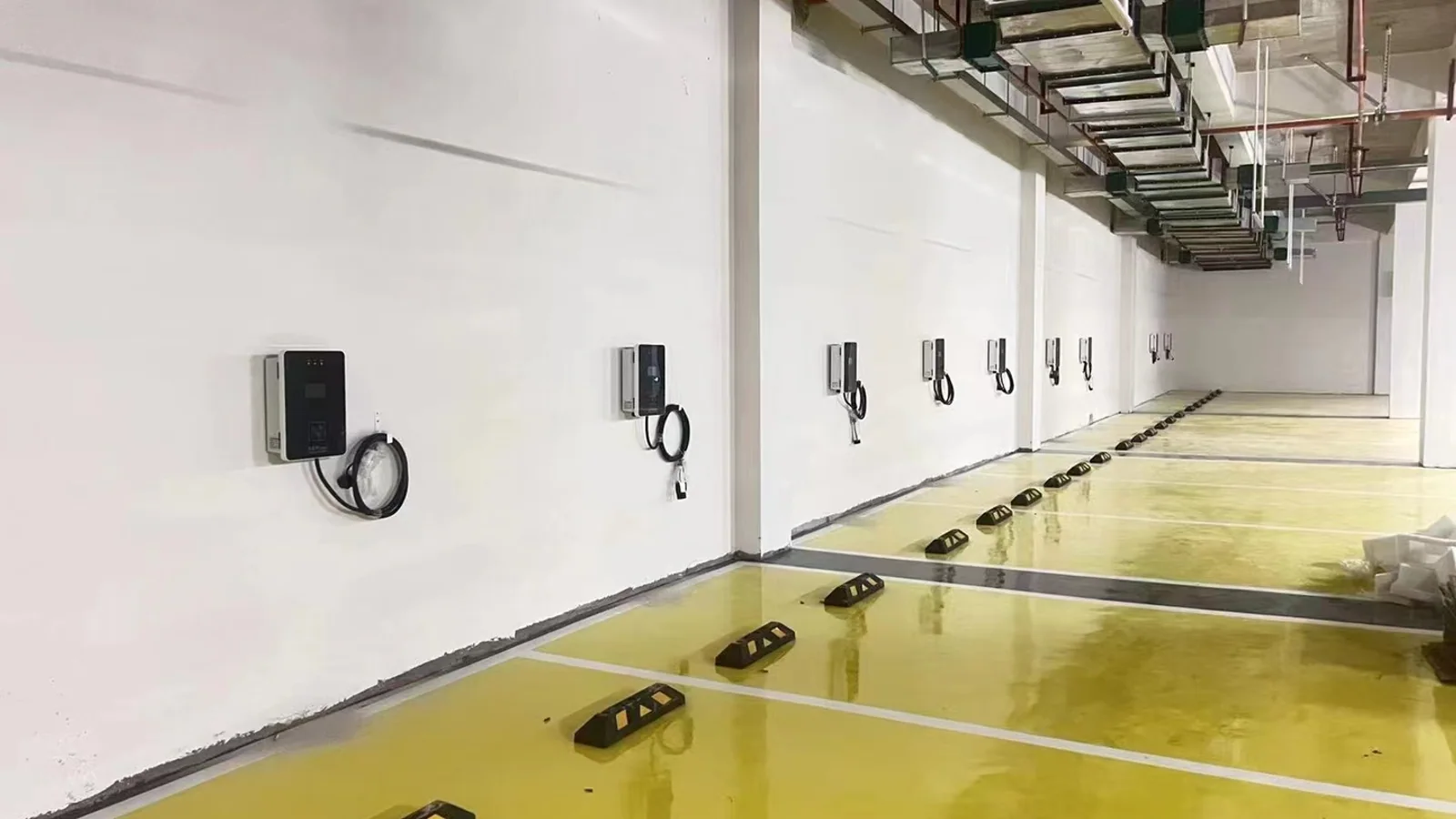 Multiple EV charging positions in a commercial-property parking garage