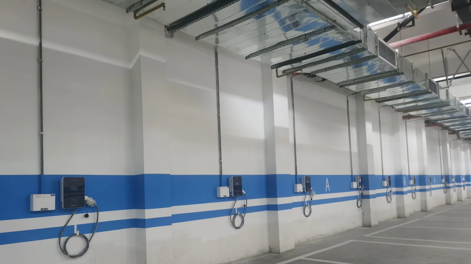 Commercial property parking area with multiple EV charging positions