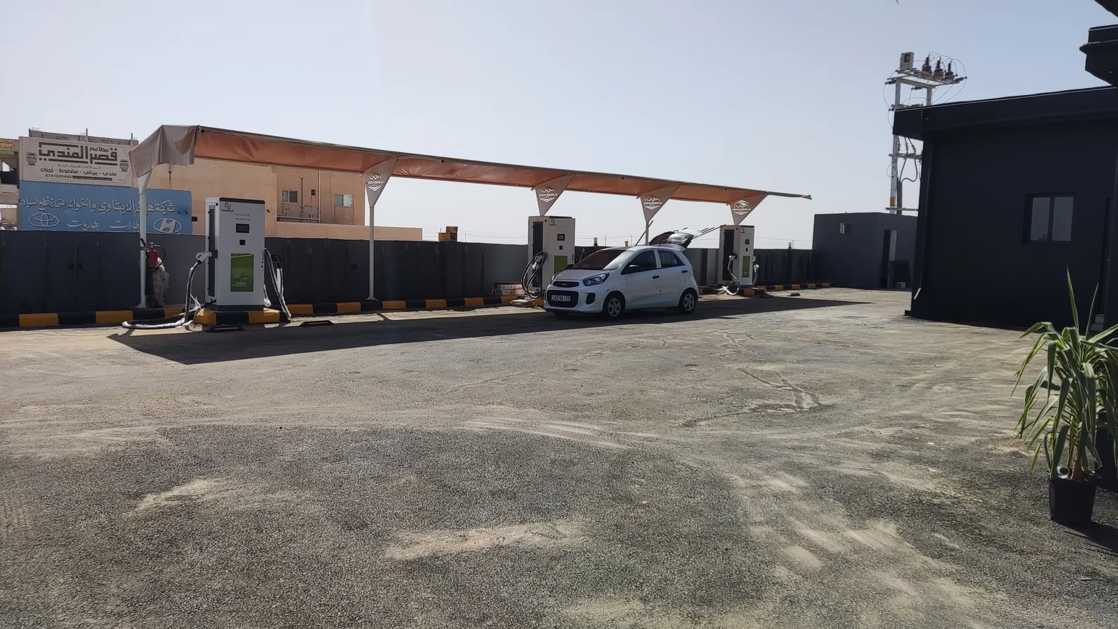 Outdoor public EV charging station project with multiple charger bays in Jordan