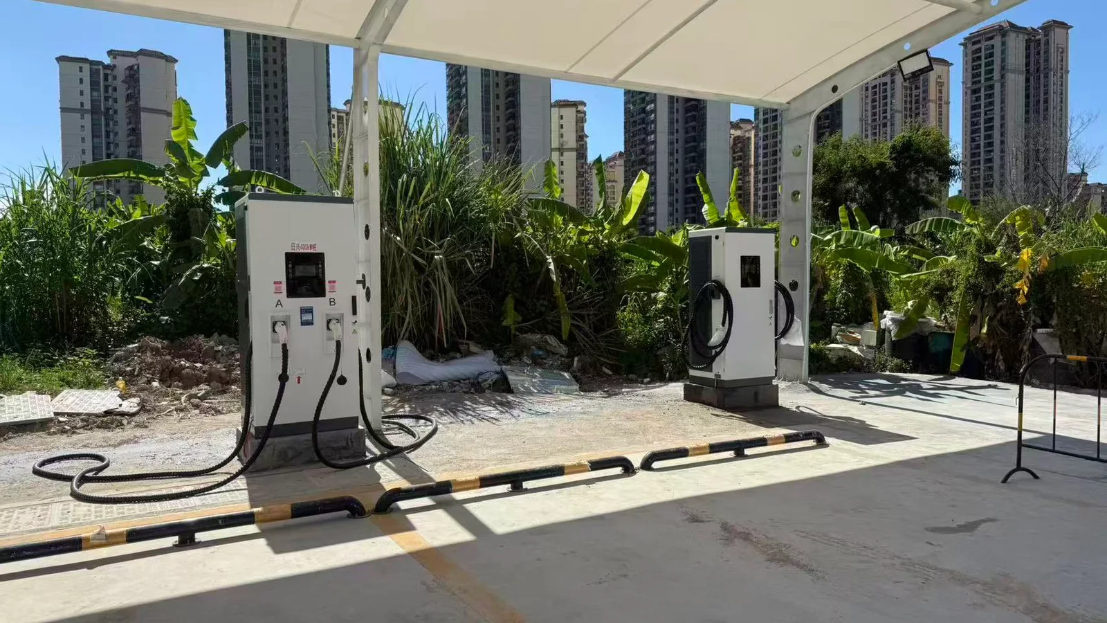 Installed dual-cable DC charging cabinets at a supplied project site