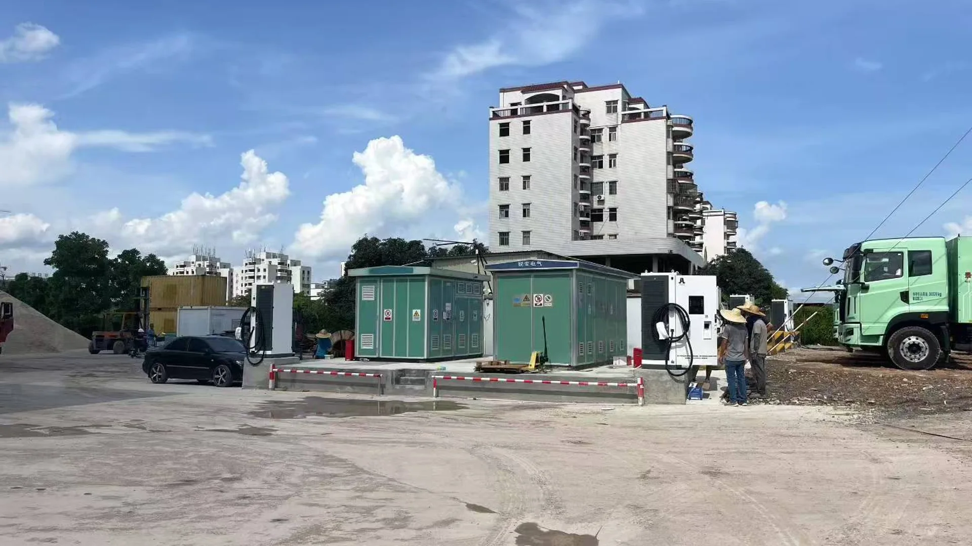 Dual-cable DC charger installed at a real heavy-vehicle charging site