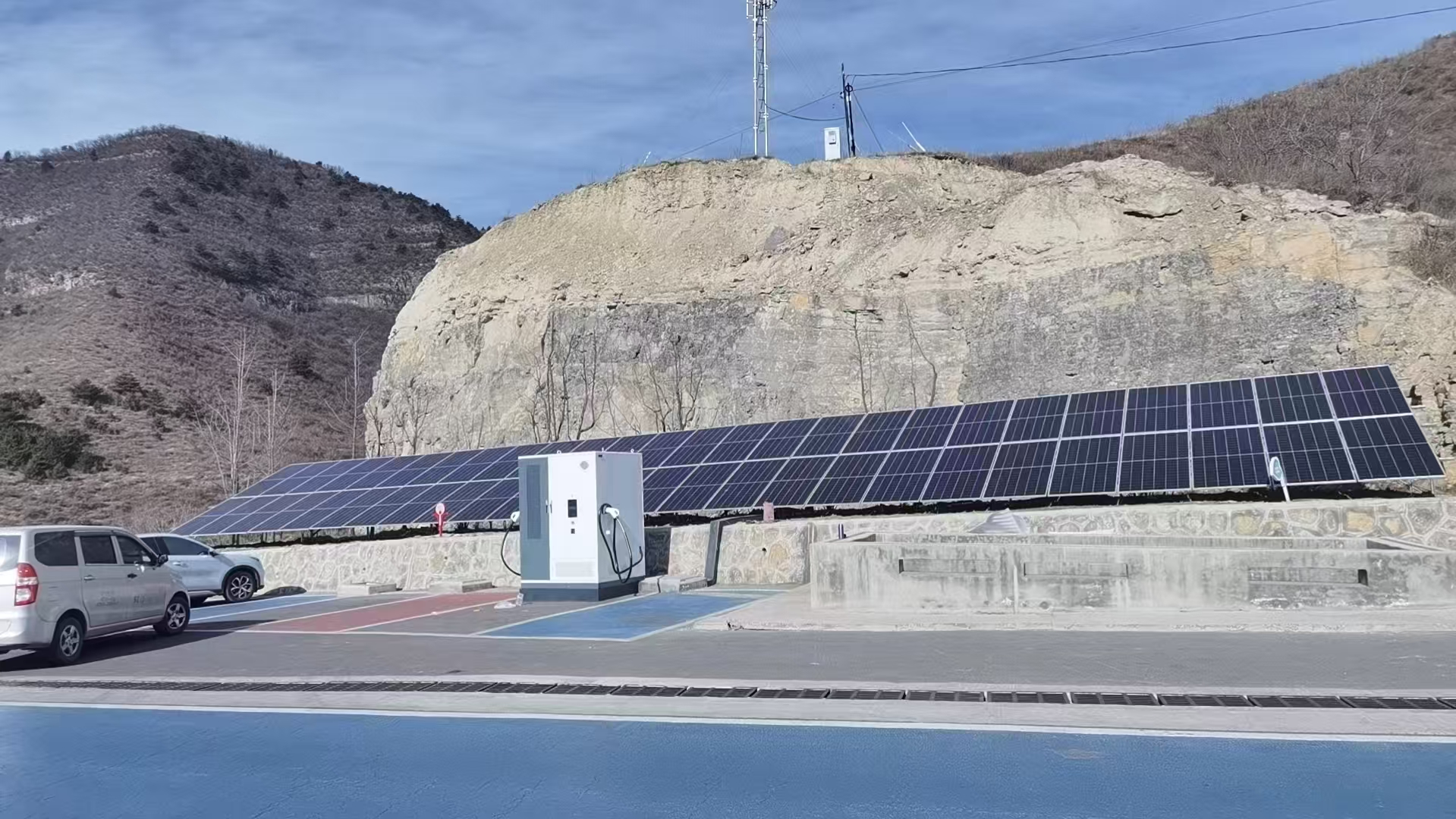 PV array and EV charging equipment at a supplied remote-site project context